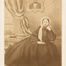 Queen Victoria in mourning, with a portrait of Prince Albert