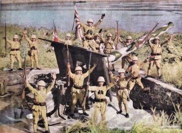 SNLF soldiers posing with a captured British coastal gun after the conquest of Christmas Island in the Indian Ocean, April 1942