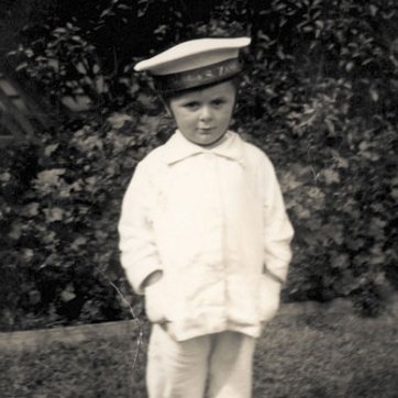 Dressed up as sailor, 1937 by Eric Humphries