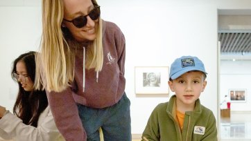 A mother and child playing in the Gallery