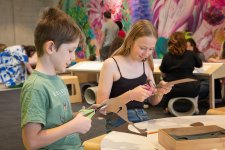 Children crafting with scissors