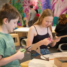 Children crafting with scissors