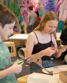 Children crafting with scissors
