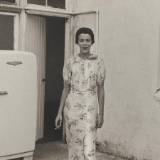 Lynn Gailey standing next to a refrigerator, 1976 Carol Jerrems