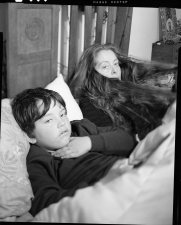 Dylan & Sarah in bed, 2024 Ryan Dandelion