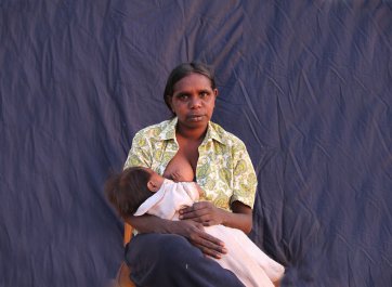 Becky feeding Hazel, 2012 by Louise Allerton