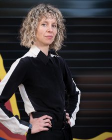Bree Pickering in front of Mikala Dwyer, Chromakinda, 2022, installation view, Murray Art Museum Albury