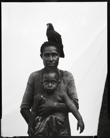 Woman, child and a parrot, 2012 by Stephen Dupont