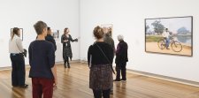 Rebecca Blake leading a tour in the National Photographic Portrait Prize 2025 exhibition