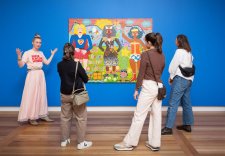 A group of people looking at Do you Believe in Love? 2025 by Kaylene Whiskey A group of people looking at Do you Believe in Love? 2025 by Kaylene Whiskey