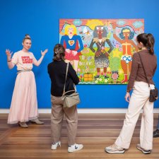 A group of people looking at Do you Believe in Love? 2025 by Kaylene Whiskey A group of people looking at Do you Believe in Love? 2025 by Kaylene Whiskey