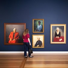A person viewing artworks in Gallery Five A person viewing artworks in Gallery Five