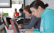 Two students using laptop computers