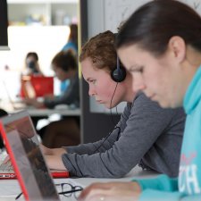Two students using laptop computers
