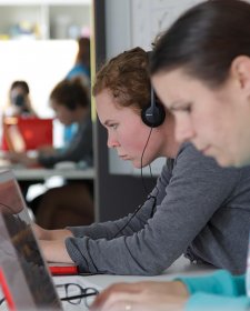 Two students using laptop computers