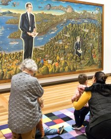 Children and parent in front of the portrait Dr Brown and Green Old Time Waltz Children and parent in front of the portrait Dr Brown and Green Old Time Waltz
