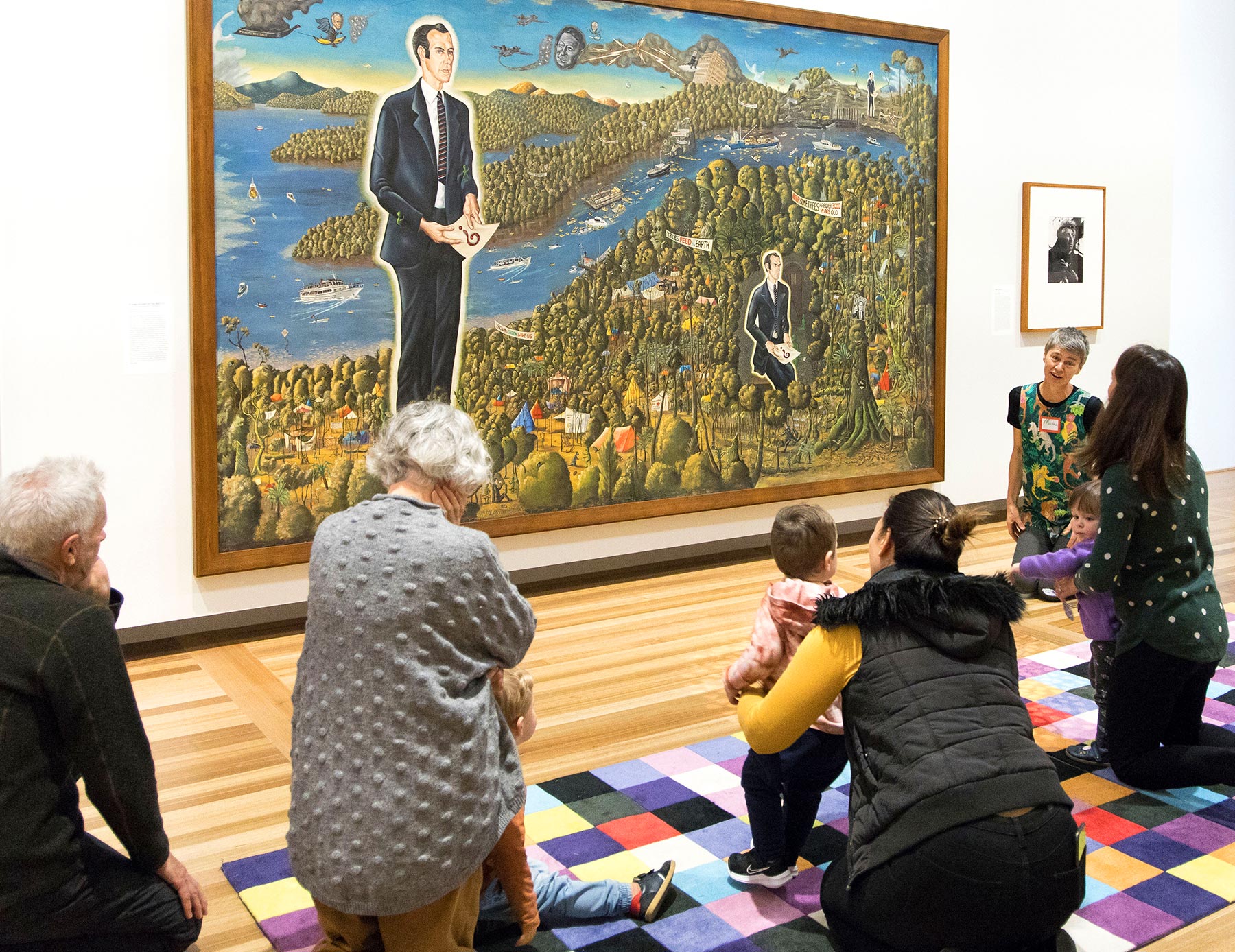 Children and parent in front of the portrait Dr Brown and Green Old Time Waltz