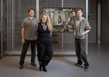 Art Handlers standing with their selected winning photograph