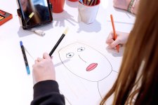 Drawing a face on paper