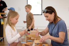 People participating in crafting activities People participating in crafting activities