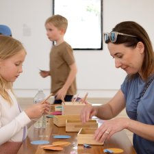People participating in crafting activities People participating in crafting activities