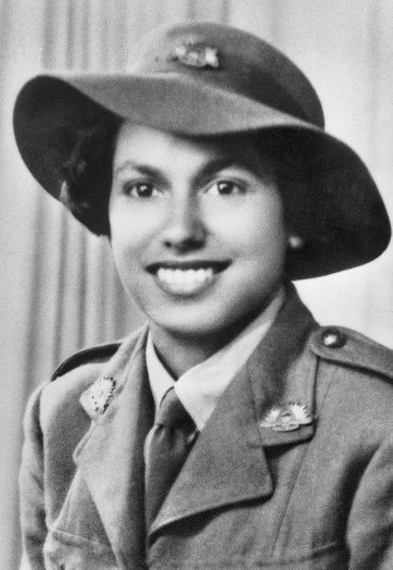 Studio portrait of servicewoman Lance Corporal Kathleen Jean Mary (Kath) Walker, c.1942 