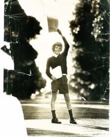 Peter Wilmoth, age 12, with copies of Our World 1974 Courtesy of the author