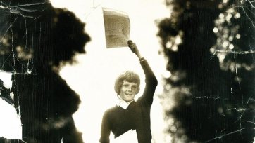 Peter Wilmoth, age 12, with copies of Our World 1974 Courtesy of the author