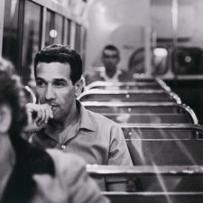 Charles Perkins on bus to Tranby Aboriginal College, Glebe