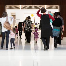 Parents and children walking into the Gallery
