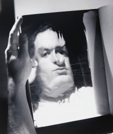 David Potts reflected in a magazine page