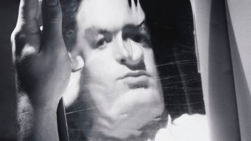 David Potts reflected in a magazine page