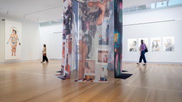 Visitors in Portrait23: Identity featuring works by Atong Atem, Dylan Mooney and Deborah Kelly.