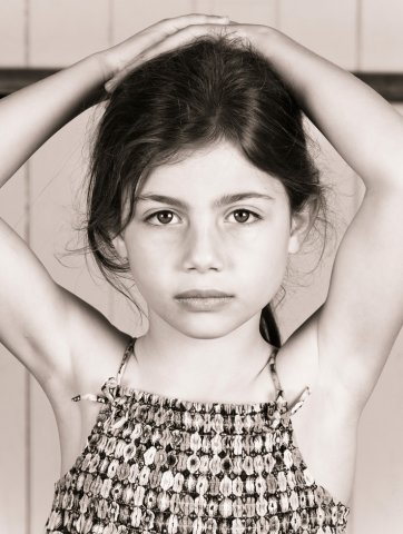 Young girl in a dance class waiting to be photographed, 2010 by John Slaytor