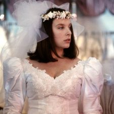 Toni Collette as Muriel trying on a wedding dress by Robert McFarlane, Muriel’s Wedding, 1994