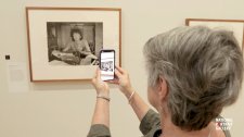 A phone recognising a photograph on a gallery wall