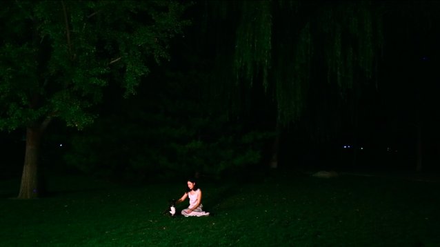Yiyi is tired after running at Yong He Jia Yuan park, Beijing, 2014