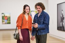 People looking at a phone app