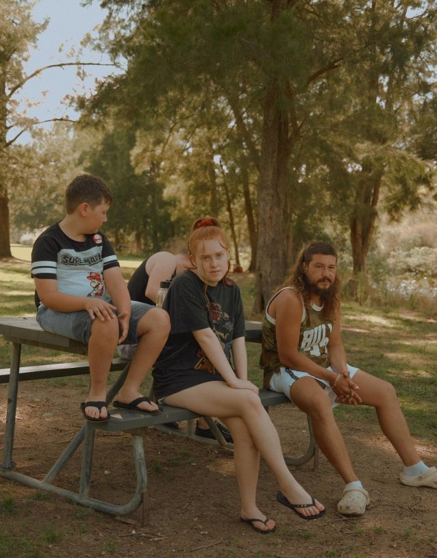 Mikayla with her brothers, 2023