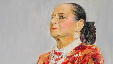 Helena Rubinstein in a red brocade Balenciaga gown