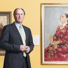 Sid Myer AM in front of Helena Rubinstein in a red brocade Balenciaga gown 1957 by Graham Sutherland. Purchased with funds provided by Marilyn Darling AC, Tim Fairfax AC and the Sid and Fiona Myer Family Foundation 2015.