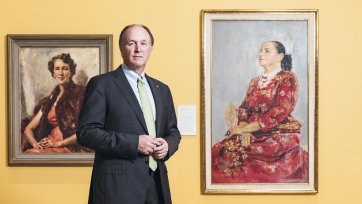 Sid Myer AM in front of Helena Rubinstein in a red brocade Balenciaga gown 1957 by Graham Sutherland. Purchased with funds provided by Marilyn Darling AC, Tim Fairfax AC and the Sid and Fiona Myer Family Foundation 2015.