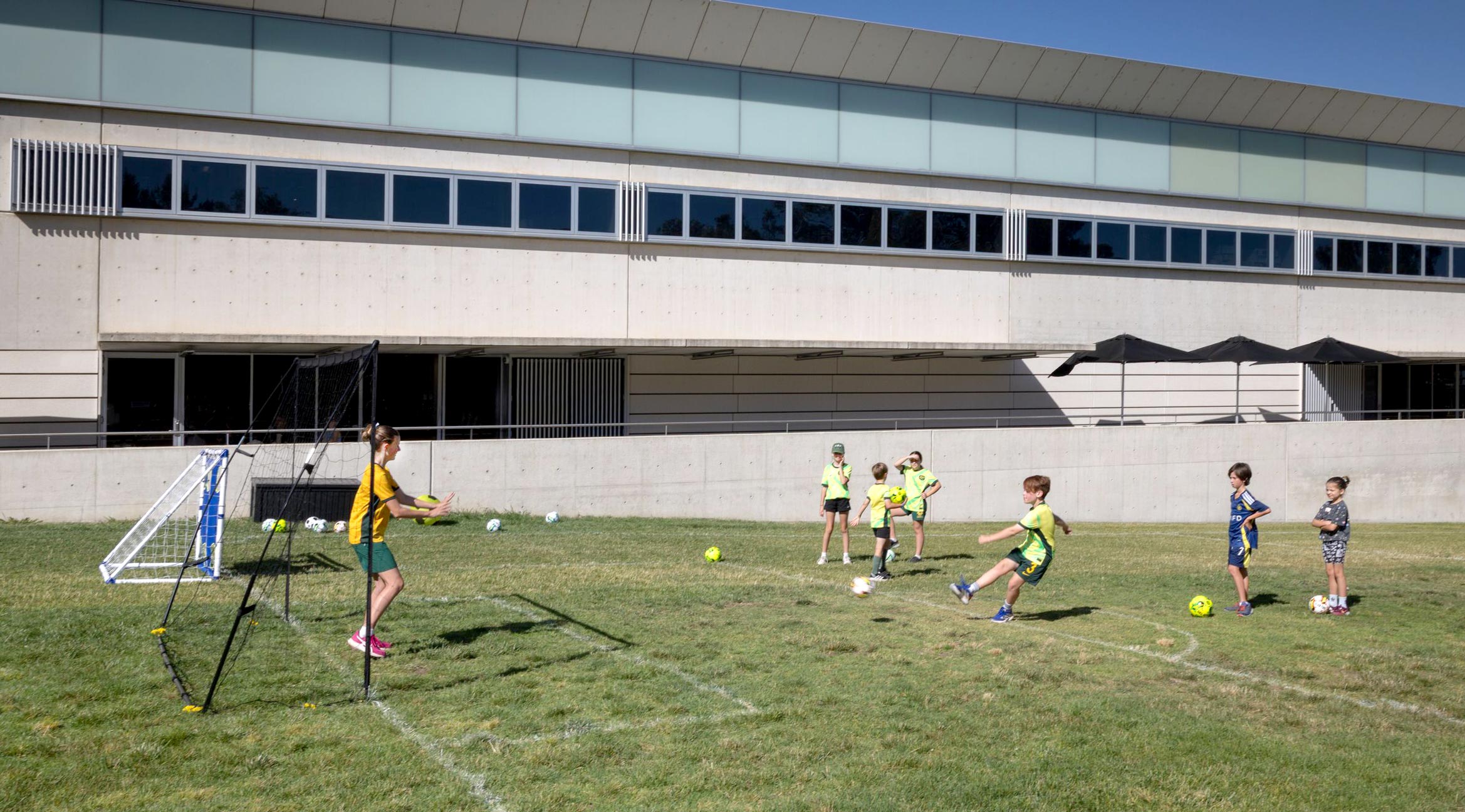 Children playing soccer outside the National Portrait Gallery