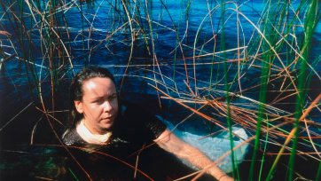 After Ophelia: Fiona Foley at Lake Mackenzie, Fraser Island (Referencing Ophelia by John Everett Millais)