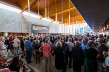A large crowd of people in the Gordon Darling Hall for the National Photographic Portrait Prize launch in 2019